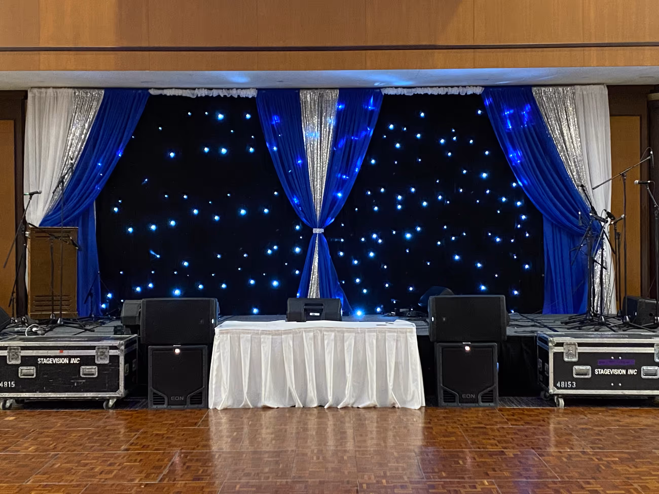 Navy silver starlight curtain backdrop stage