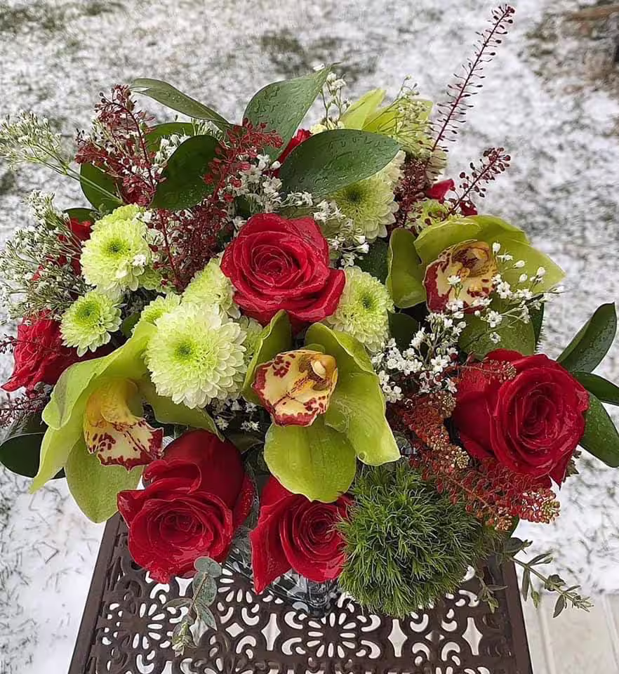 Red rose green chrysanthemum orchid holiday arrangement