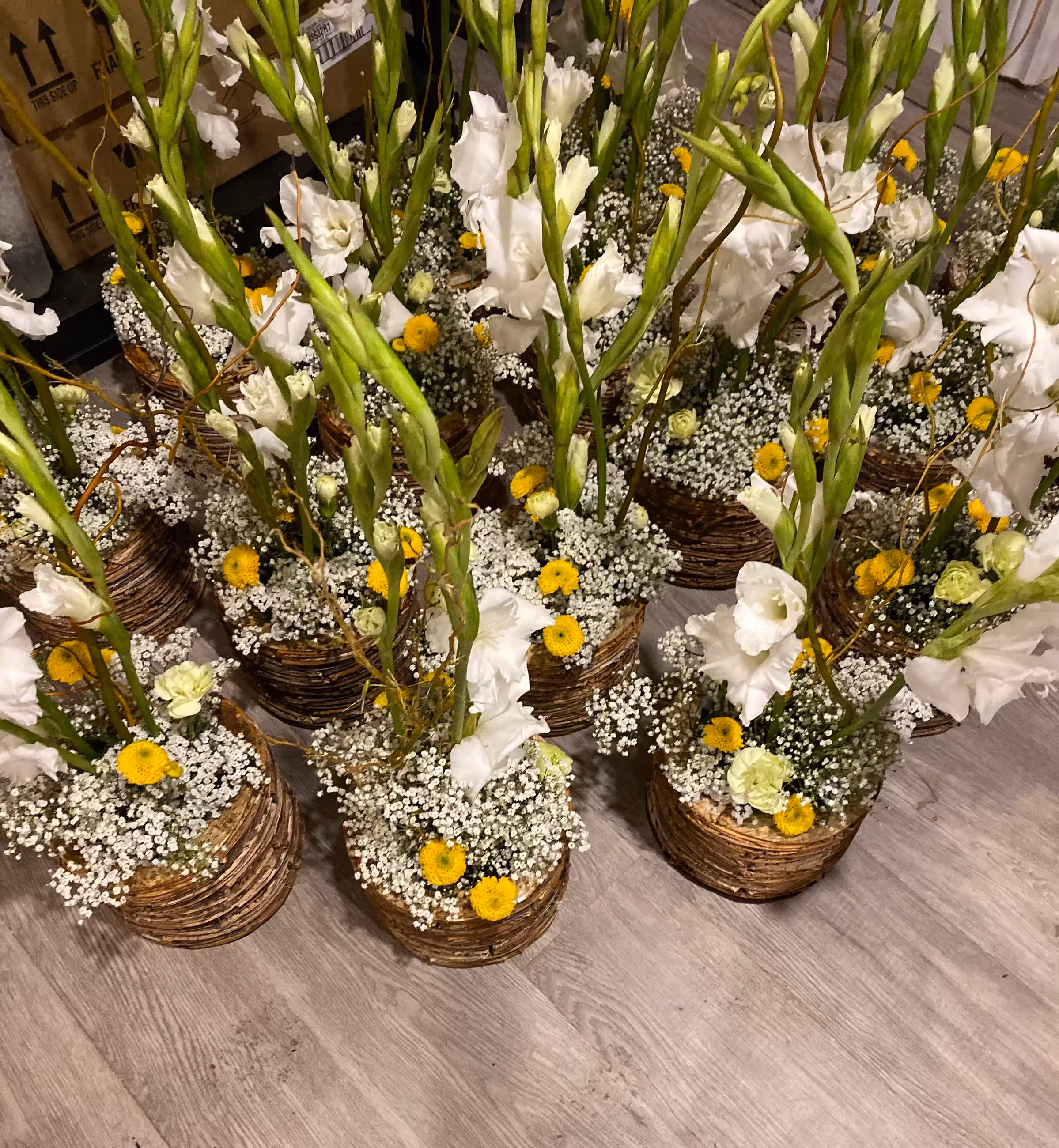 White gladiolus babys breath twig vase centerpieces