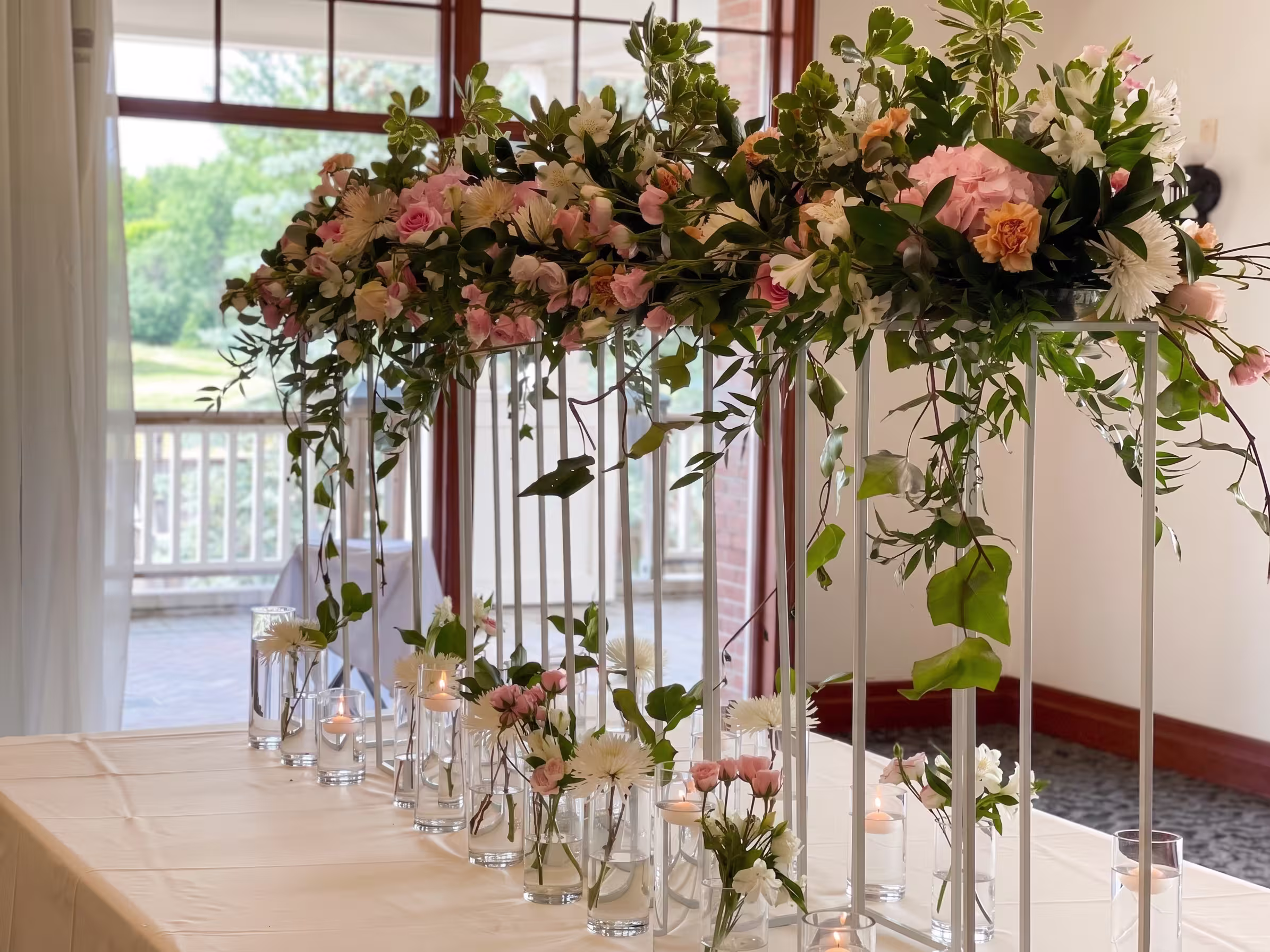 Pink peach head table flowers closeup