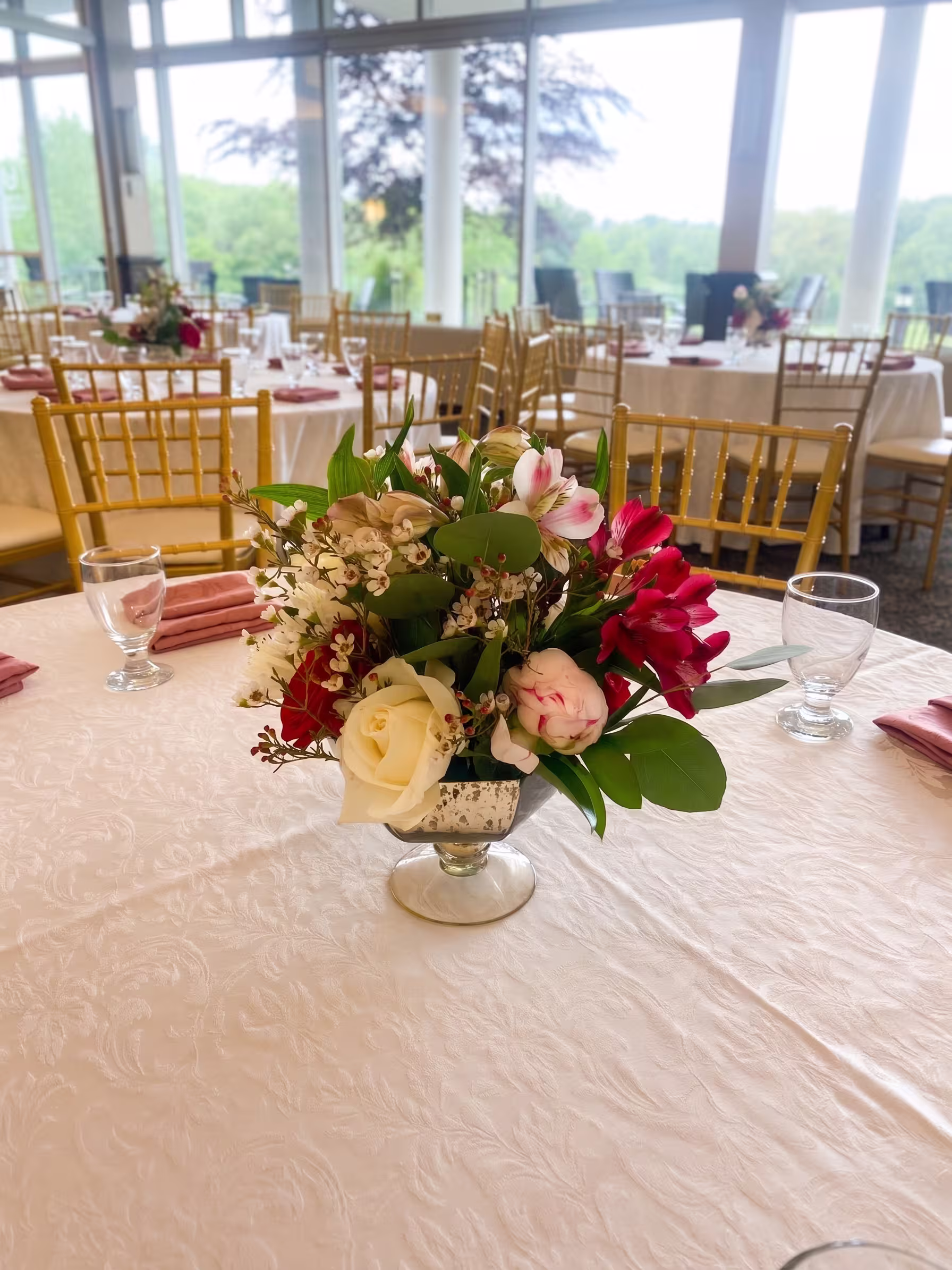 Pink red cream floral centerpiece