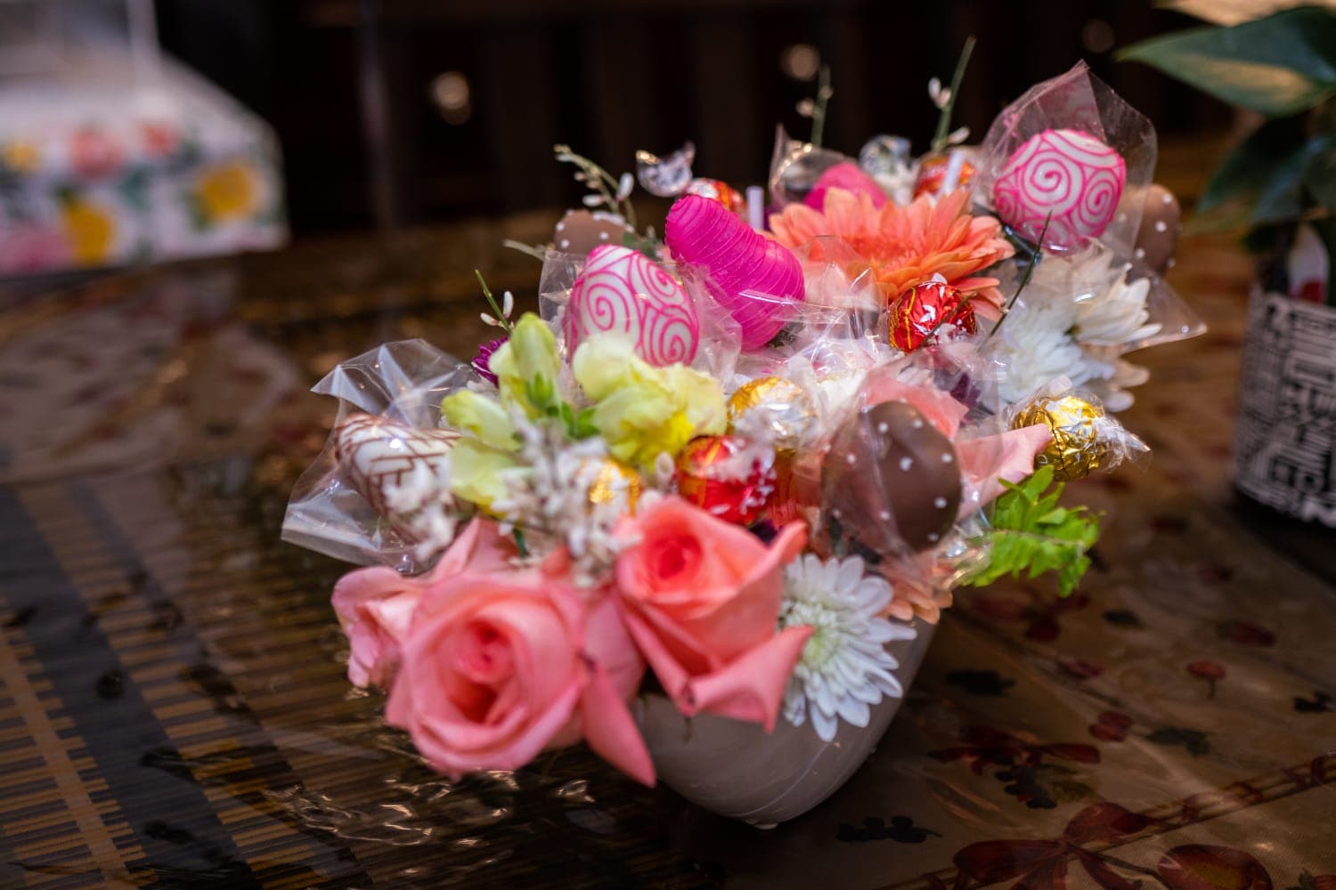 Purple Passion arrangement featuring two-tone purple roses with pink and white blooms