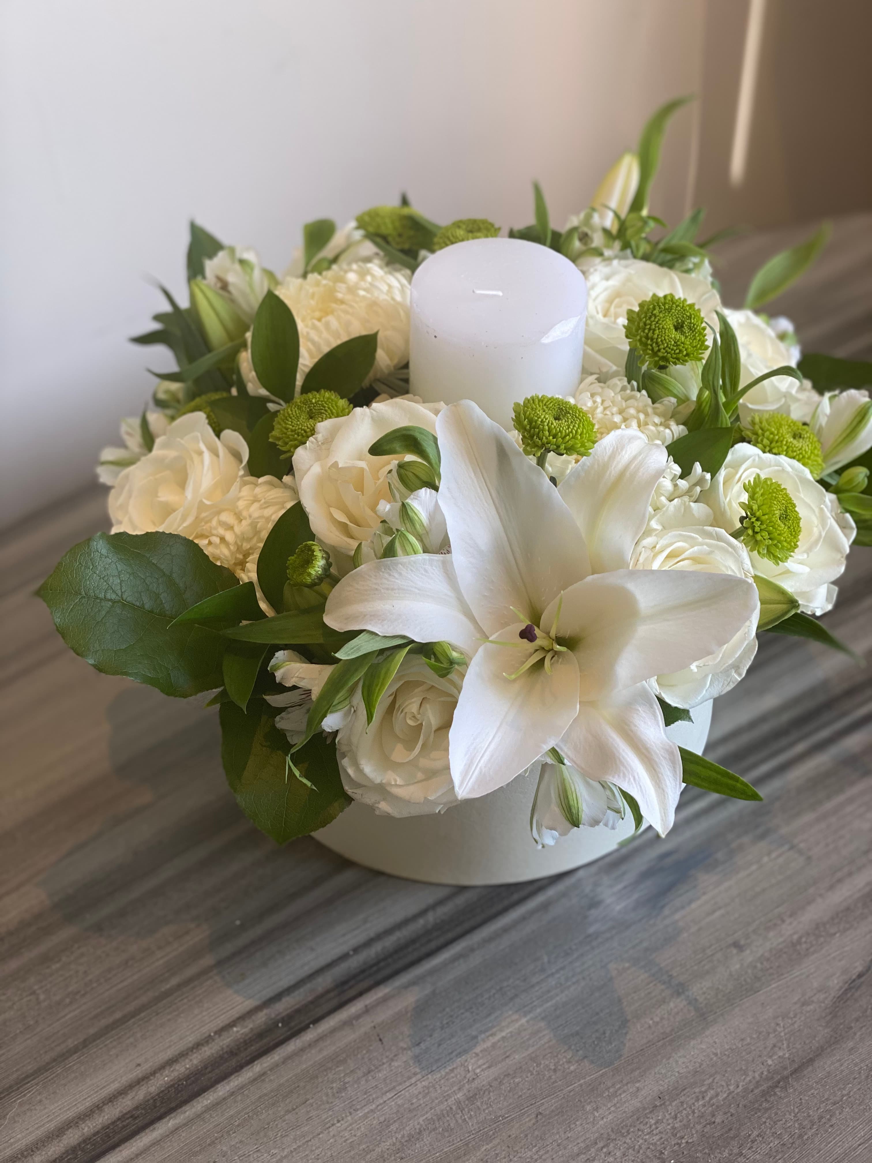 A lush white winter floral arrangement — Simply Elegant Florals