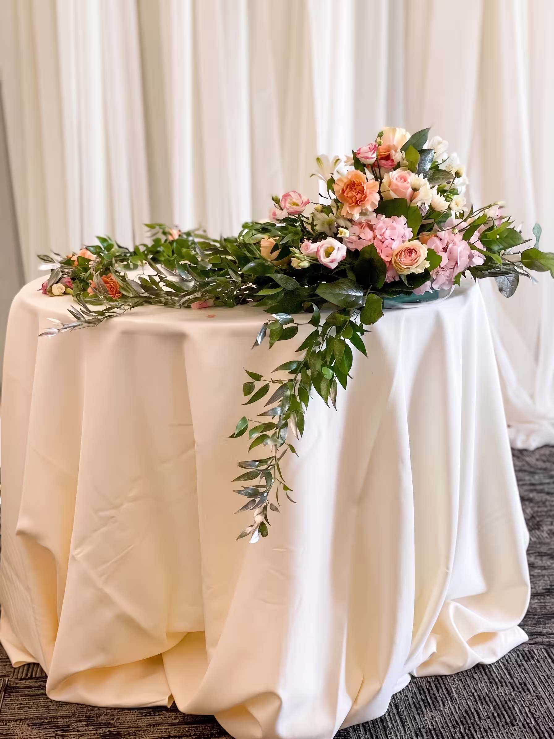 Pink peach cascading table arrangement