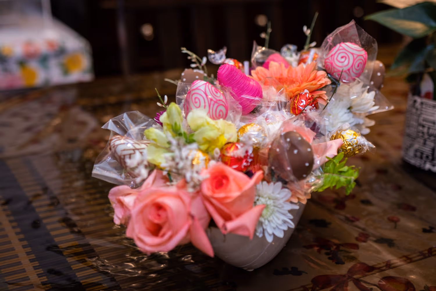Purple Passion arrangement featuring two-tone purple roses with pink and white blooms